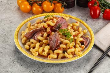 Italian pasta cellentani with anchovy