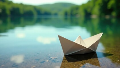 Obraz premium Simple paper boat resting on the shore of a serene lake, greenery, shore
