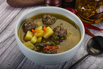 Soup with beef meatballs and vegetables