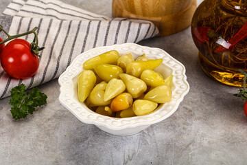 Turkish traditional marinated mini chili peppers