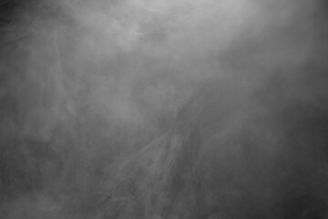 black and white background with smoke
