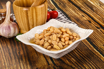 Baked white canned beans in the bowl