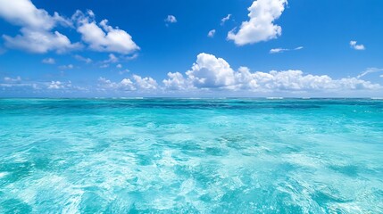 Fototapeta premium Crystal clear turquoise ocean waters sparkling under bright blue sky with fluffy clouds : Generative AI
