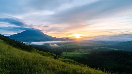 Obraz premium Breathtaking Sunset Over Tranquil Valley with Lush Green Hills and Majestic Volcano : Generative AI
