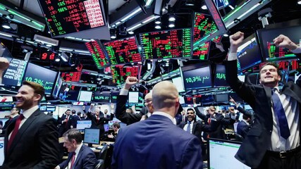 Traders and analysts actively conduct transactions amid numerous screens displaying stock prices and financial data. The atmosphere reflects the dynamic nature of the market. - Powered by Adobe