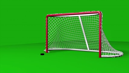 A hockey puck slowly flies into the goal on a green background. - Powered by Adobe