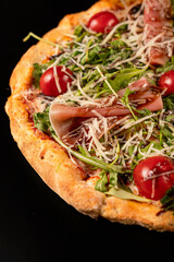 pizza with salami and vegetables