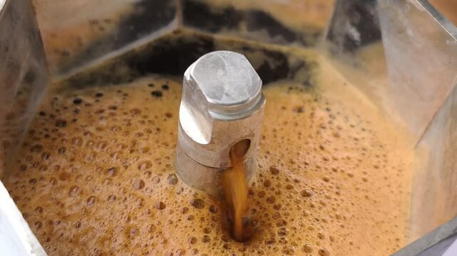 making coffee with typical italian coffeepot