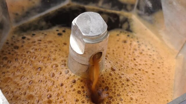 making coffee with typical italian coffeepot