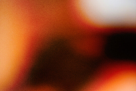 Abstract orange and red colors on a dark black background