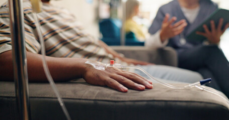 Fototapeta premium Nurse, IV needle and consultation at a hospital with vaccine and healthcare infusion for virus. Medicine, clinic and medical support with patient and helping with blood sample for health treatment