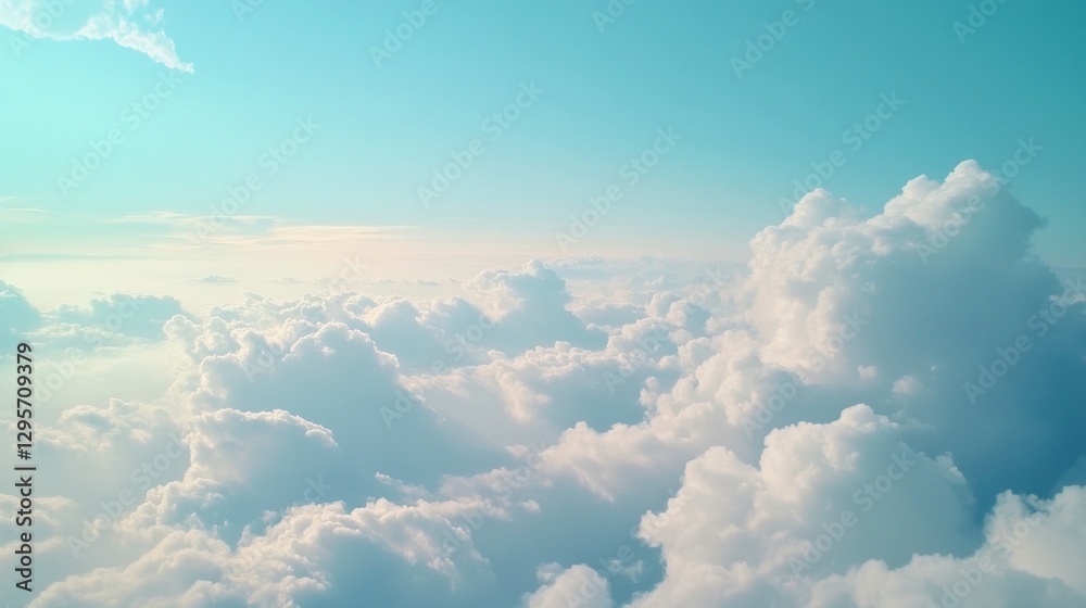 Poster fluffy white clouds float peacefully in a bright blue sky, creating a sense of calm and wonder. this