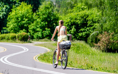 Cyclist ride on the bike path in the city Park
