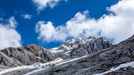 Majestic Snow-Capped Mountain Peaks Under Bright Blue Sky with Fluffy Clouds : Generative AI