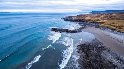 Aerial View of Rocky Beach with Waves and Dramatic Cloudy Sky on a Coastal Landscape : Generative AI