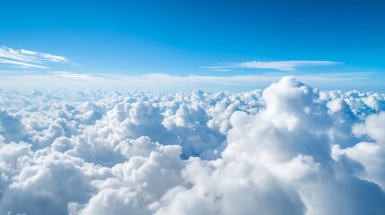 Fototapeta premium Fluffy white clouds scattered across a bright blue sky offering a serene atmosphere : Generative AI