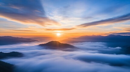 Fototapeta premium Breathtaking Sunrise Over the Mountains with Vibrant Colors and Misty Landscape Below : Generative AI