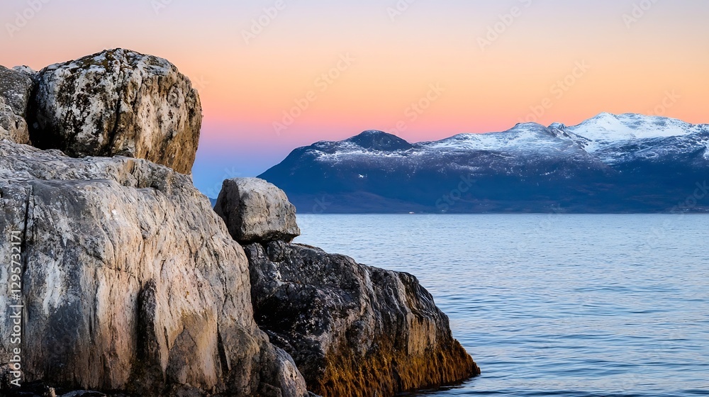 Poster serene coastal sunset over rocks with snowy mountains creating tranquil landscape : generative ai