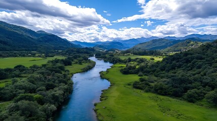 Aerial View of River Flowing Through Lush Green Valley Surrounded by Mountains : Generative AI