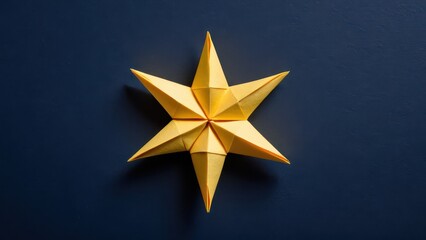 Obraz premium a vibrant origami star shining against a deep blue background