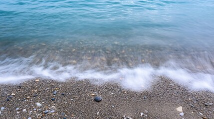 Obraz premium Gentle waves lapping on a sandy beach capturing the tranquil essence of coastal serenity : Generative AI