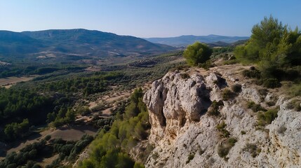Breathtaking Aerial View of Rocky Cliff Overlooking Lush Valley and Rolling Hills : Generative AI