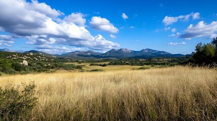 Fototapeta premium Picturesque grassy landscape under blue sky with rolling hills and mountains : Generative AI