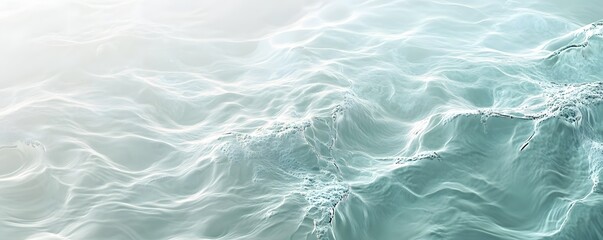 Obraz premium Gentle waves ripple across the surface of turquoise water