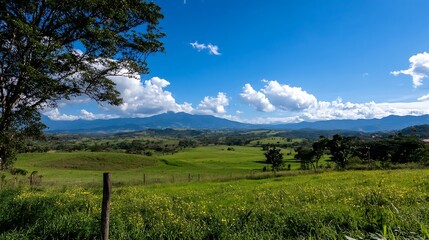 Breathtaking Panoramic View of Rolling Hills and Majestic Mountains Under Clear Sky : Generative AI