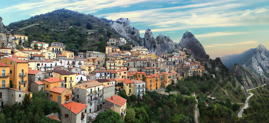 Fototapeta premium Colorful traditional village Castelmezzano, surrounded by rocky mountains in Basilicata southern region of Italy