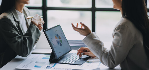 Group of Asian business people team meeting in modern office working design planning and ideas concept