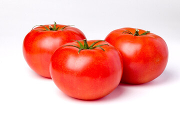 Three Tomatoes on White Background