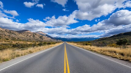 Obraz premium Wide Open Road Stretching Through Scenic Landscape with Beautiful Clouds Above : Generative AI