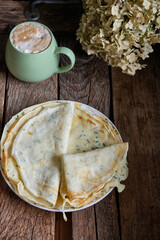 crepes with green onions, sour cream