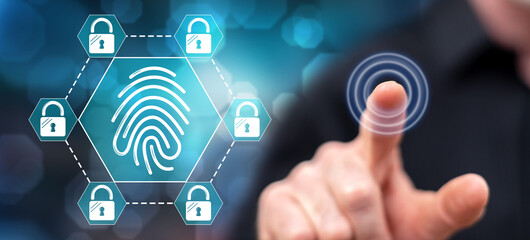 Fototapeta premium Man touching a fingerprint security system concept