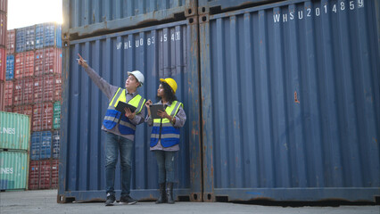 Engineers and technicians inspect the standards of containers that are made
