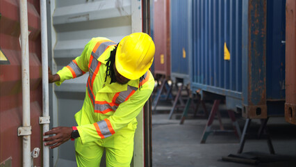 Technicians inspect container repairs by welding at container