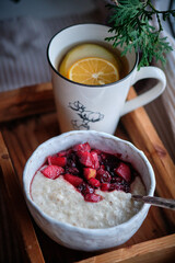 oatmeal rice pudding with cherry apple sauce. side view	