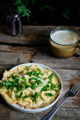 Omelette with cheese and green onions