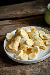 poppy seed crepes with banana and white chocolate