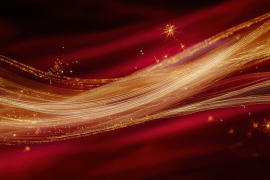 A dynamic abstract background featuring flowing golden and red light trails, creating a sense of movement and elegance. The design includes sparkling stars and a smooth gradient effect.