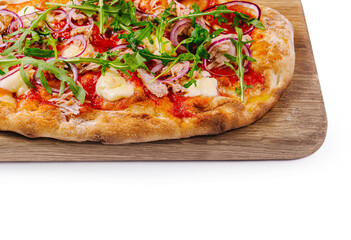 Fresh gourmet pizza with arugula on wooden board