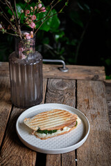 sandwich with cheese, broccoli and turkey. homemade bread. Top view. Wooden background	