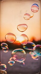 Tranquil background with bubbles floating in the sunset. Image toned in vintage instagram colors. Square composition.