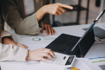 Group of Asian business people team meeting in modern office working design planning and ideas concept