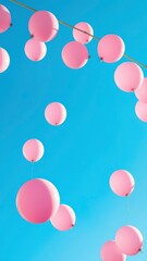  Pink Balloon Decoration Floating Against a Clear Blue Sky for a Festive Celebration