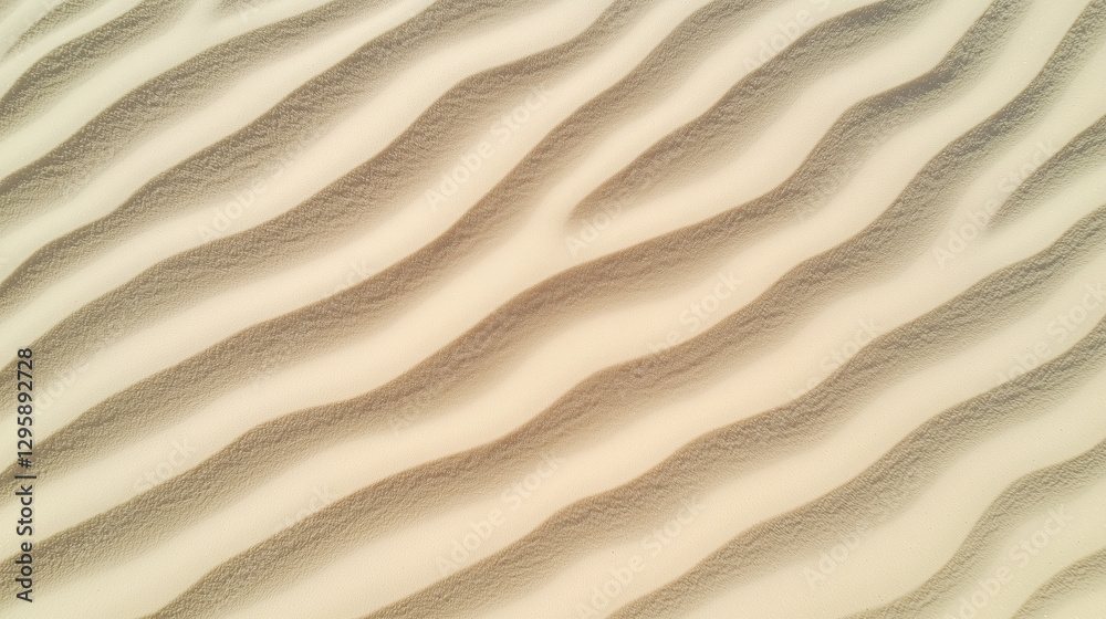 Aufkleber Aerial view of sand dunes with wavy patterns creating serene landscape