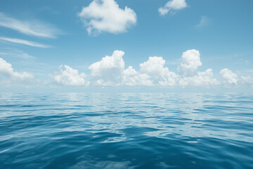 Obraz premium calm ocean with clear blue sky and fluffy white clouds creates serene scene