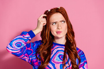 Photo portrait of pretty young girl skeptical look empty space wear trendy blue colorful outfit...