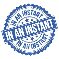 Obraz premium IN AN INSTANT text on blue round stamp sign